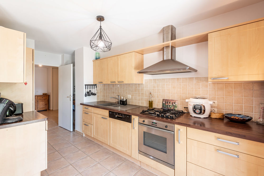 Appartement T4 de 90 m² avec balcon, garage et cave