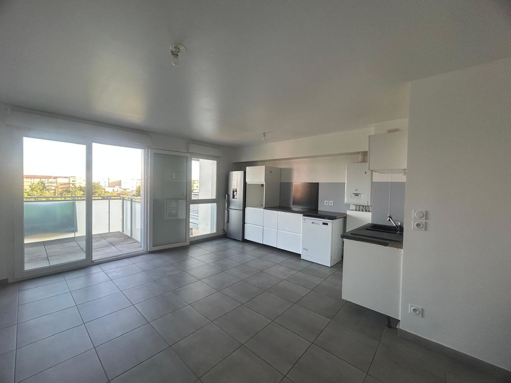 d'un appartement t 3 de ,60 M2 au coeur de Décines cha