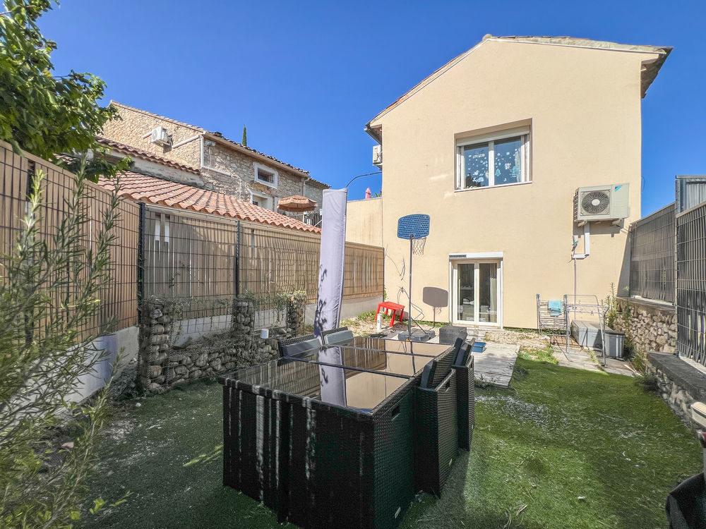 Ensemble immobilier de 2 logements de type 3 dont un loué