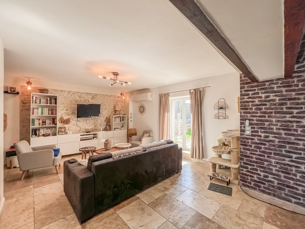 Ensemble immobilier de 2 logements de type 3 dont un loué
