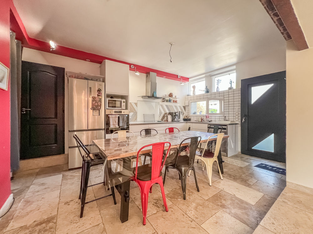 Ensemble immobilier de 2 logements de type 3 dont un loué