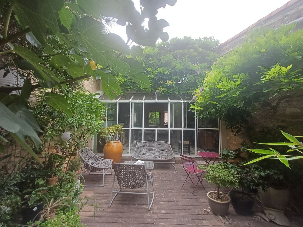 Maison de village avec extérieur et garage