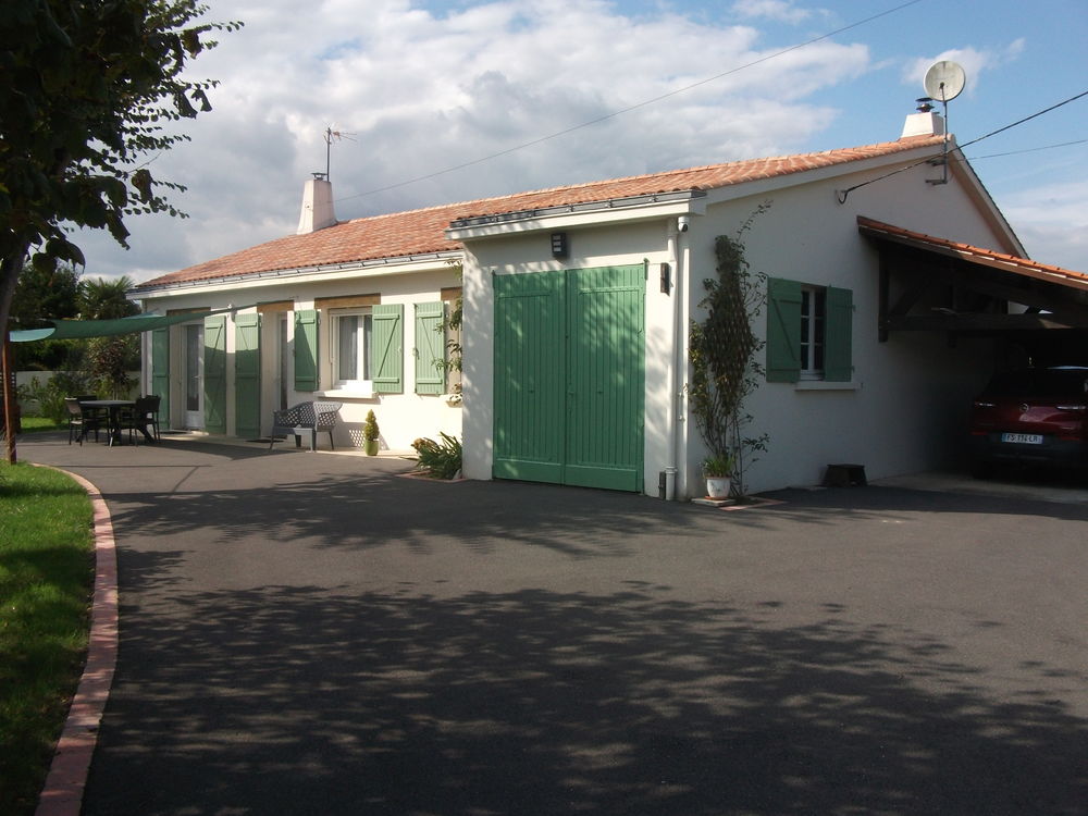 MAISON DE PLAIN PIED AVEC JARDIN