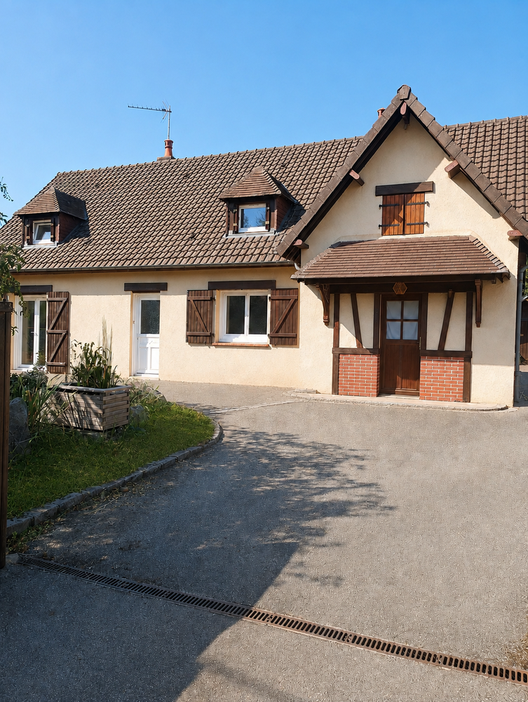 Maison familiale avec jardin, garage et fort potentiel d'amé