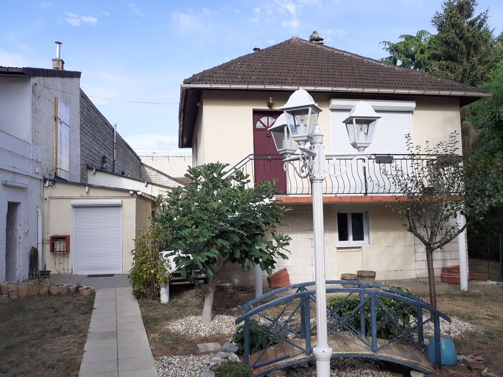 Maison dans résidence