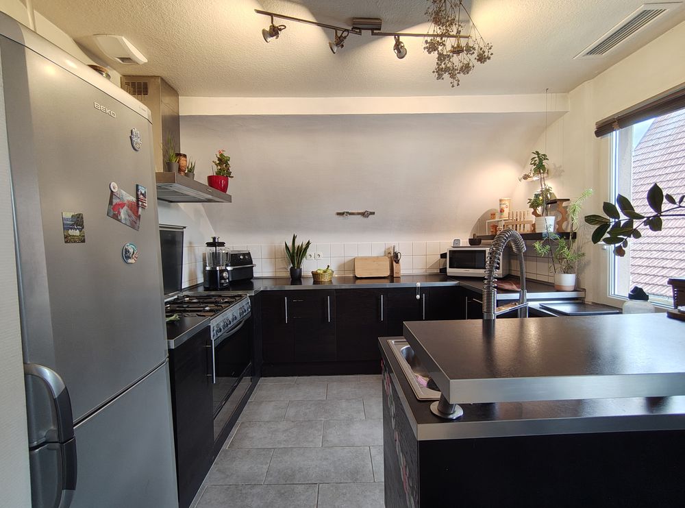 Appartement T3 climatisé, avec cour, cave et garage ? Centre