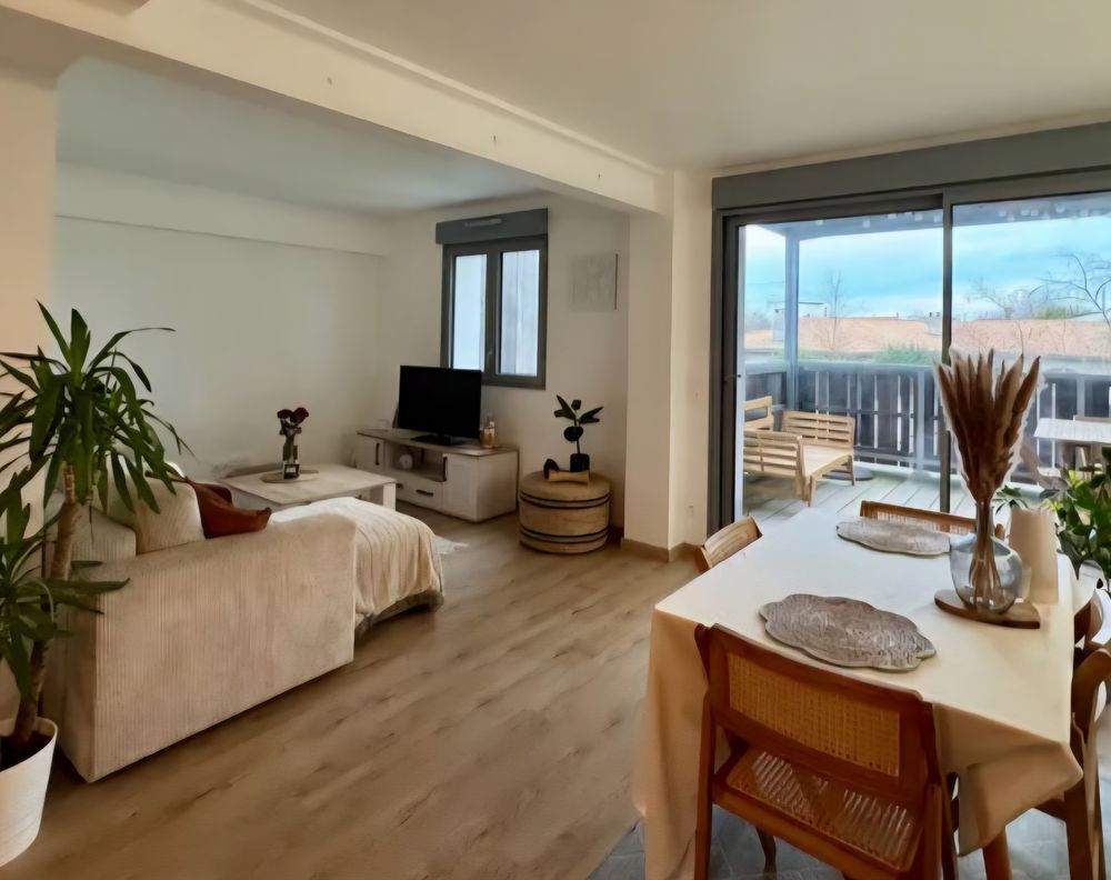 Appartement T3 de 69 m² avec terrasses, parking et cave