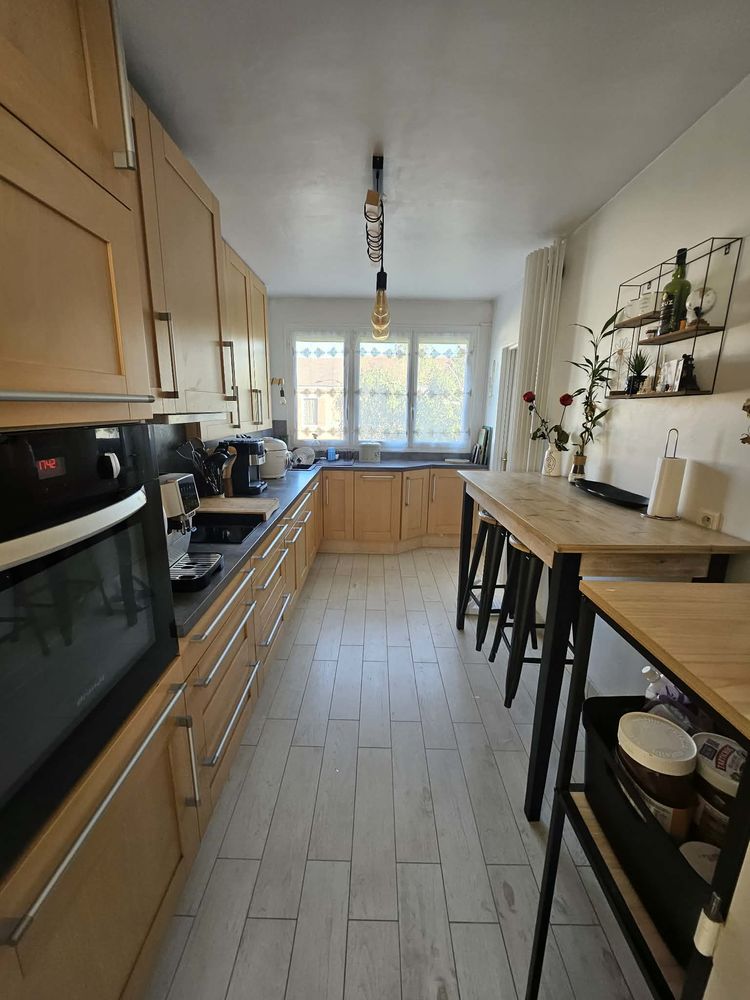 Appartement T3 traversant de 73 m² garage et cave