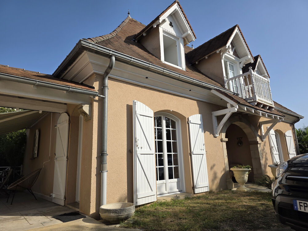 Maison de charme sur terrain arboré