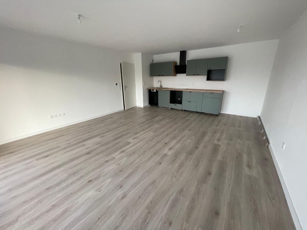Appartement T4 avec deux balcons et deux places de parking