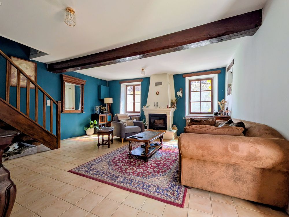 Maison de charme en pierres et poutres apparentes
