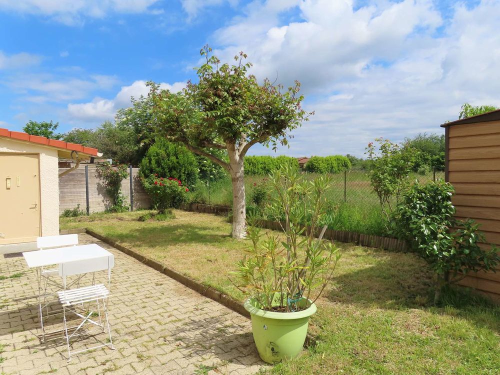 Appartement 85 m² en rez -de- jardin /garage 24m² attenant