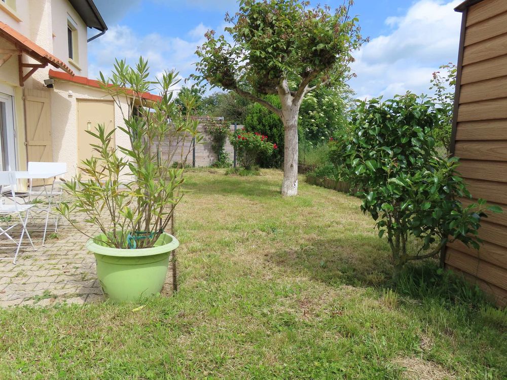 Appartement 85 m² en rez -de- jardin /garage 24m² attenant