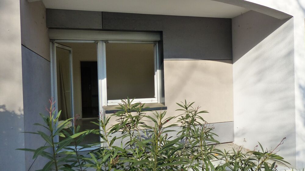 Appartement studio T1bis de 27m2 à Meylan (38) rez de jardin