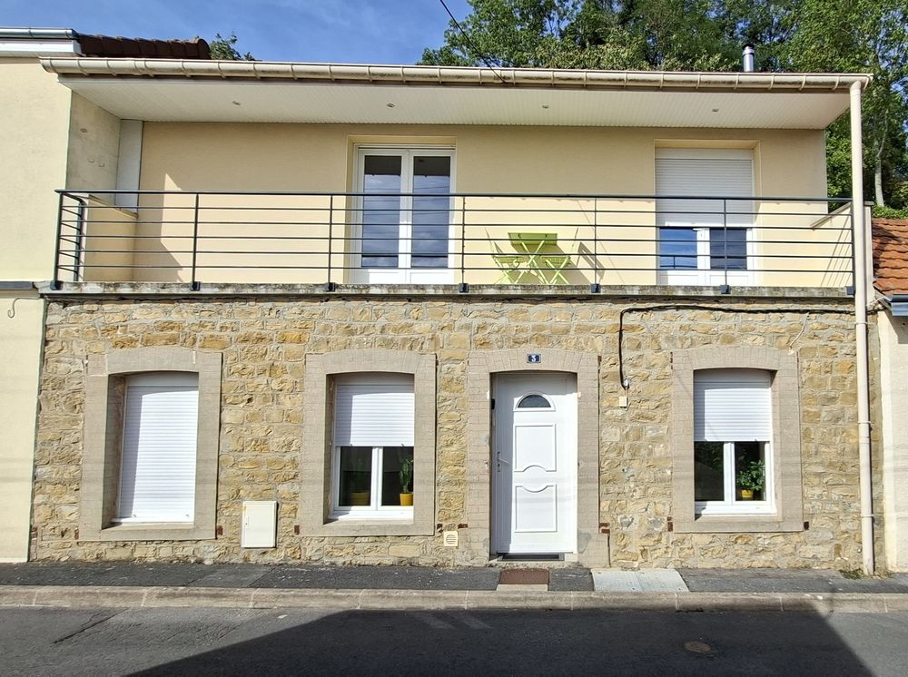 Maison familiale avec garage et jardin