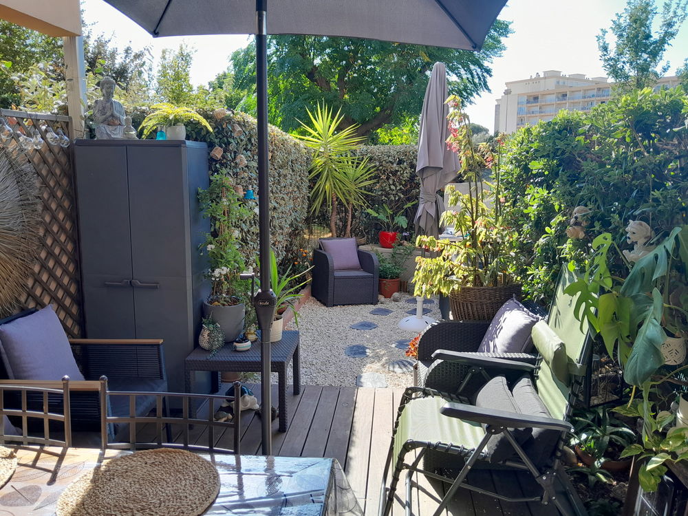 rez-de-jardin avec jardin privatif et parking