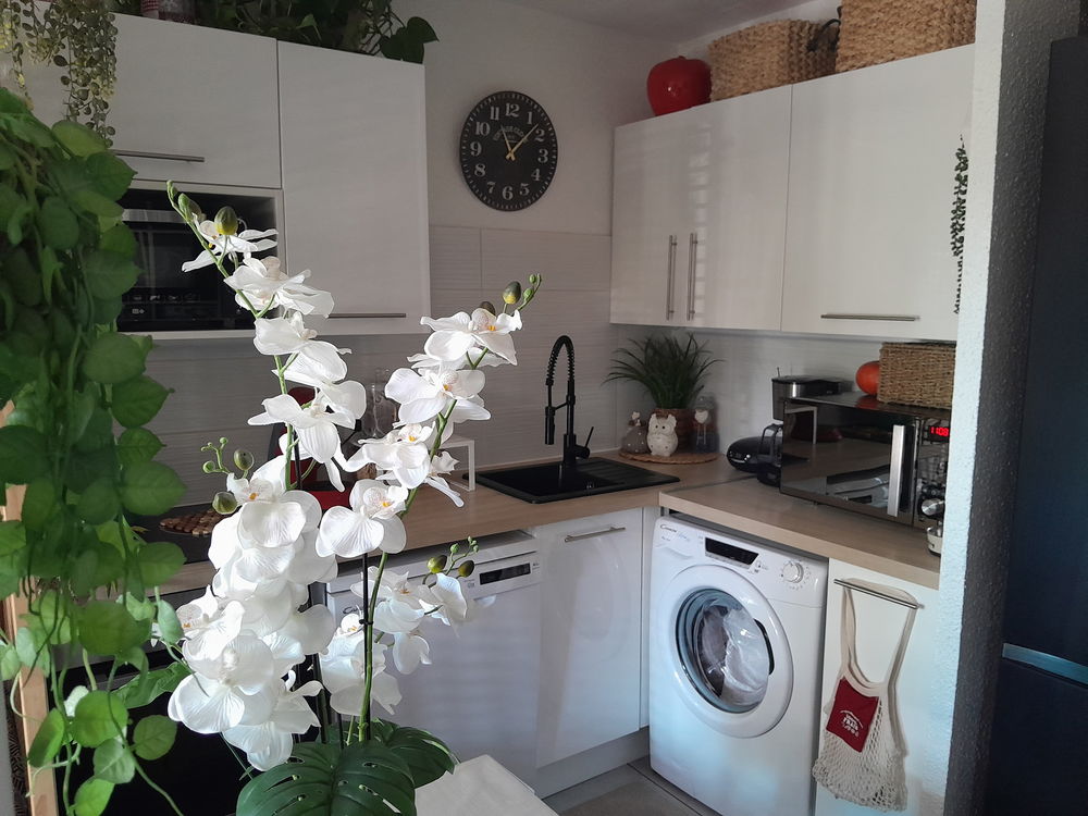 rez-de-jardin avec jardin privatif et parking