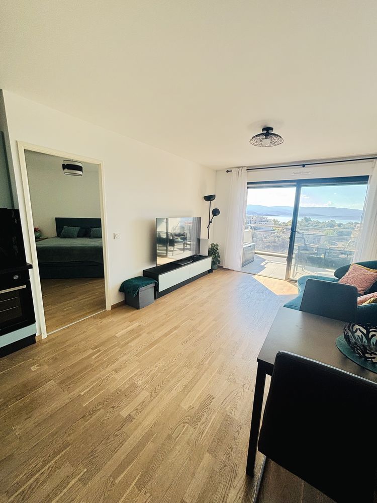 T2 standing vue mer panoramique + parking privé