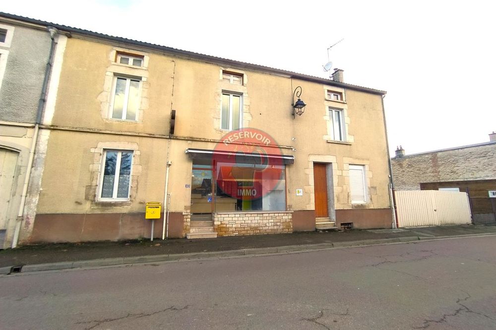 BÂTIMENT D'HABITATION AVEC ANCIEN COMMERCE A VENDRE A AI....