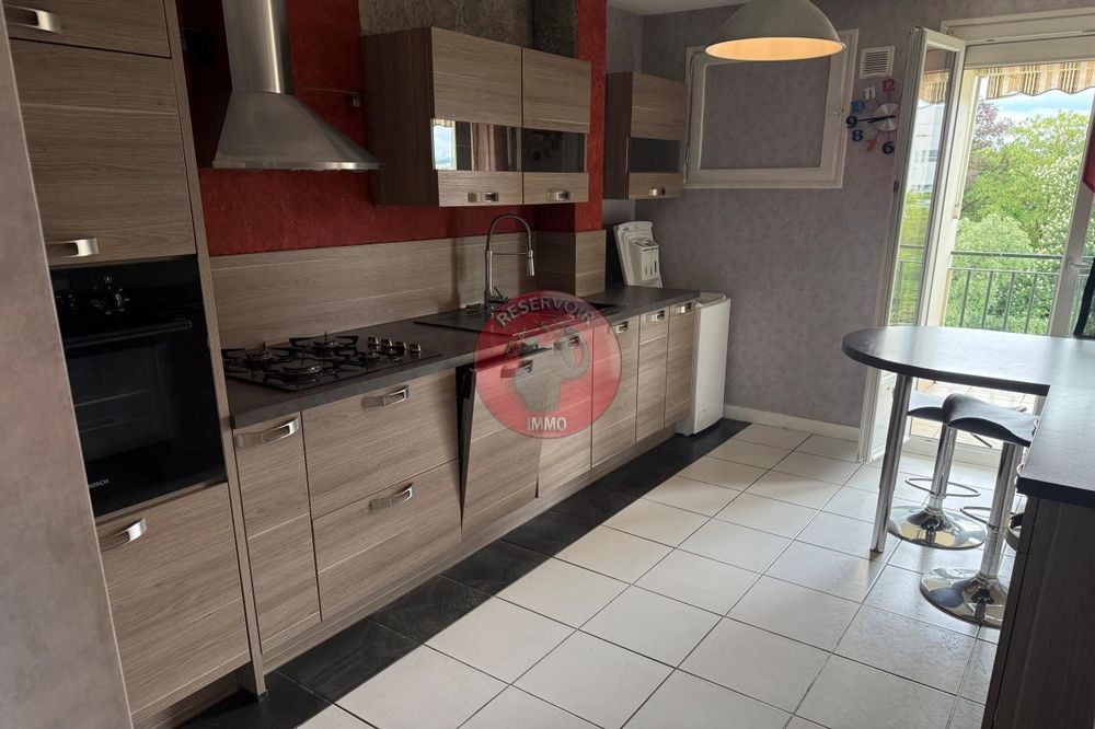 Appartement T4 avec balcon, garage et parkings  Proche ....