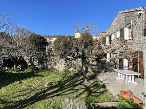   Charmante et spacieuse maison de village en pierres apparentes avec jardin, garage et cave Maison - 6 pi�ce(s) - 139 m�
