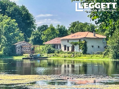   Ancien moulin en pierre am�nag� en maison de 2 chambres avec gite ind�pendant grange et un etang de 3.8 ha. Maison - 9 pi�ce(s) - 232 m�