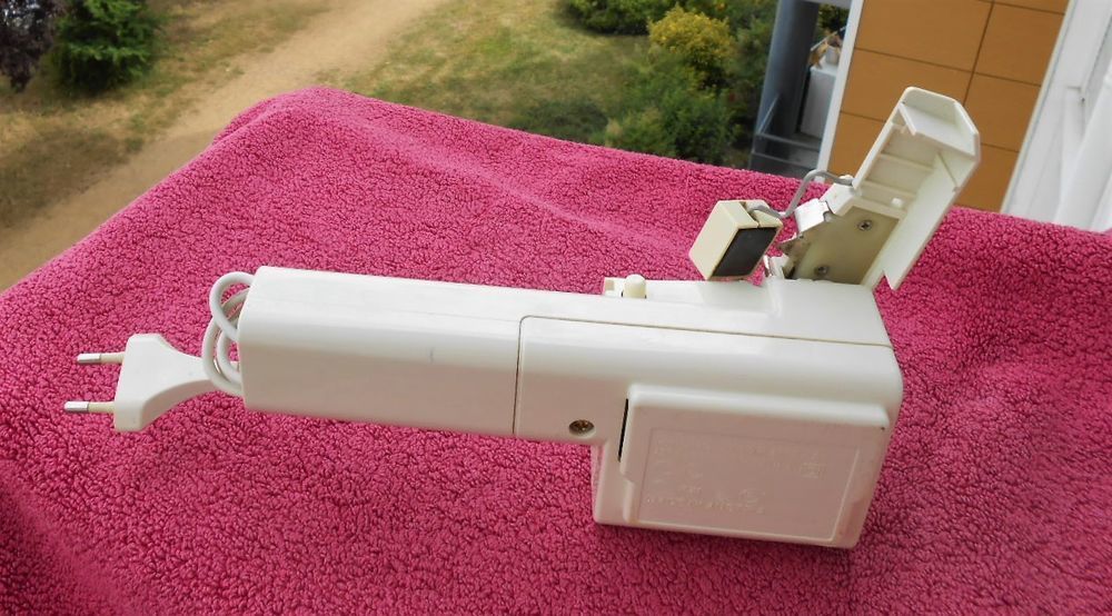 ouvre-bo&icirc;tes &eacute;lectrique PHILIPS et son range fil Electroménager