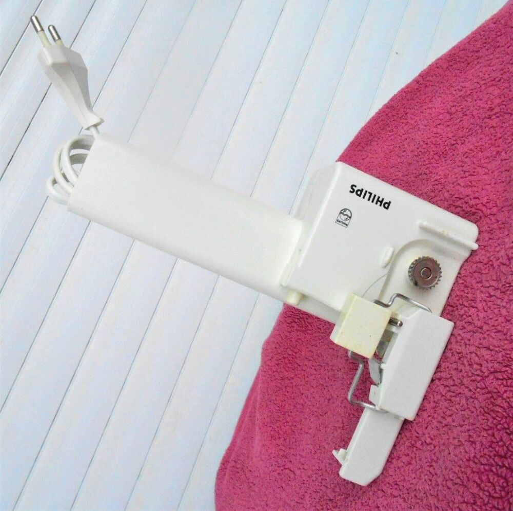 ouvre-bo&icirc;tes &eacute;lectrique PHILIPS et son range fil Electroménager