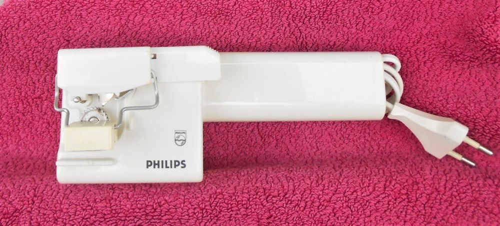 ouvre-bo&icirc;tes &eacute;lectrique PHILIPS et son range fil Electroménager