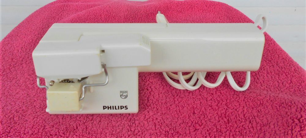 ouvre-bo&icirc;tes &eacute;lectrique PHILIPS et son range fil Electroménager