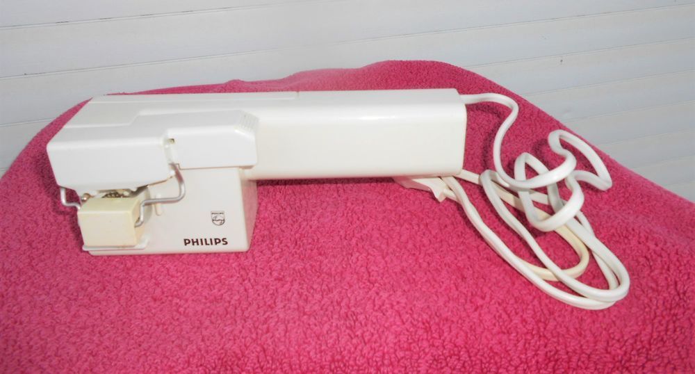 ouvre-bo&icirc;tes &eacute;lectrique PHILIPS et son range fil Electroménager