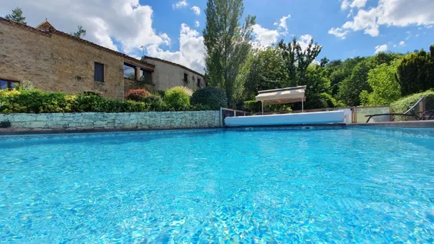   Maison pour 4 pers. avec piscine partagée et terrasse à Puy-l'Évêque Piscine collective - Télévision - Terrasse - Balcon - place Midi-Pyrénées, Puy-l'Évêque (46700)