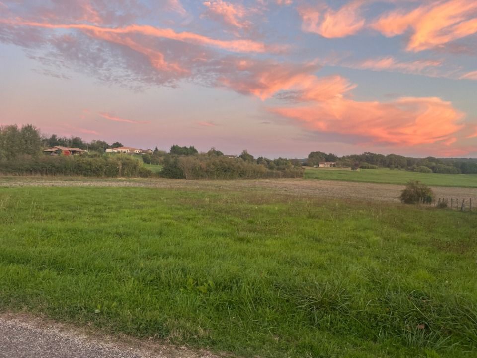A proximité de Puymiclan : terrain de 1 700 m² à vendre<....